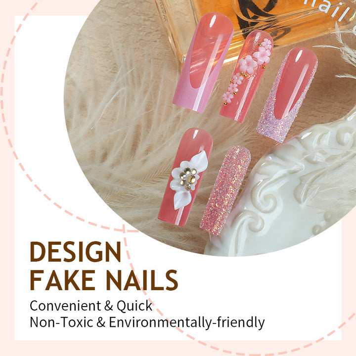 Artificial nail set with romantic floral and glitter elements Stornfield