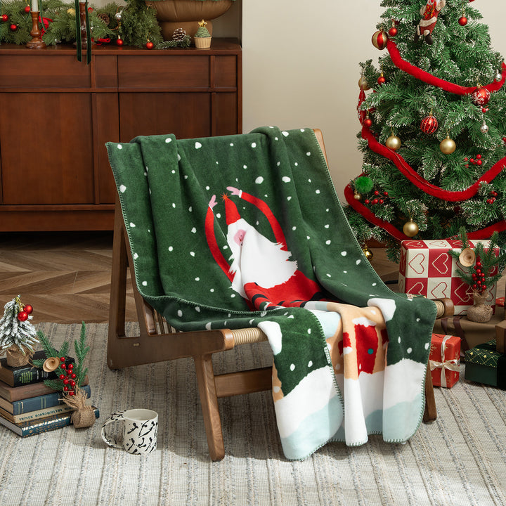 Soft Christmas fleece blanket with gift and gingerbread motif Stornfield
