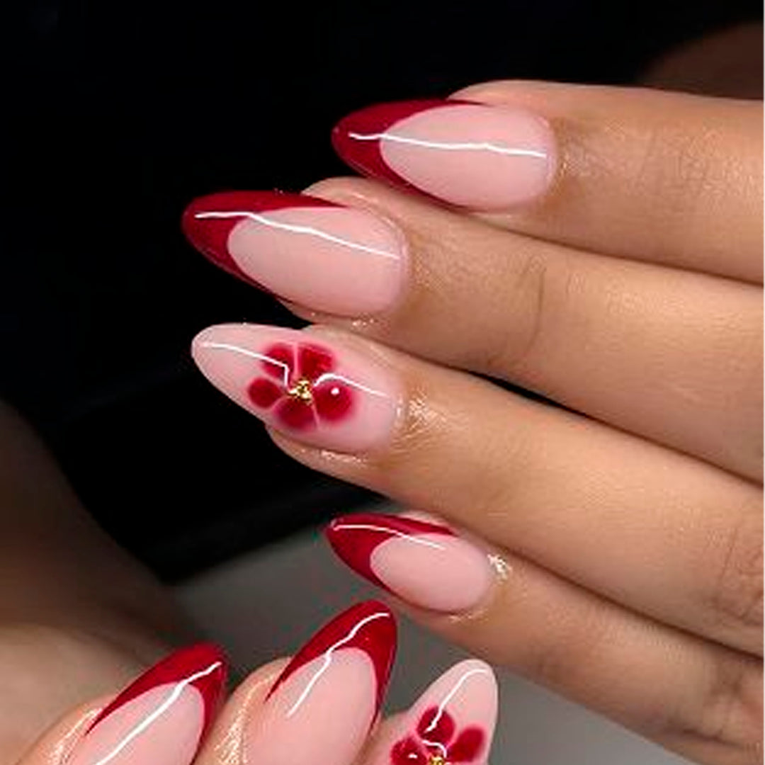 Elegant and artistically designed stiletto nails with flower design Stornfield