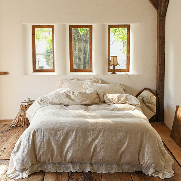 Vintage-inspired linen bedding set with subtle floral damask & ruffle