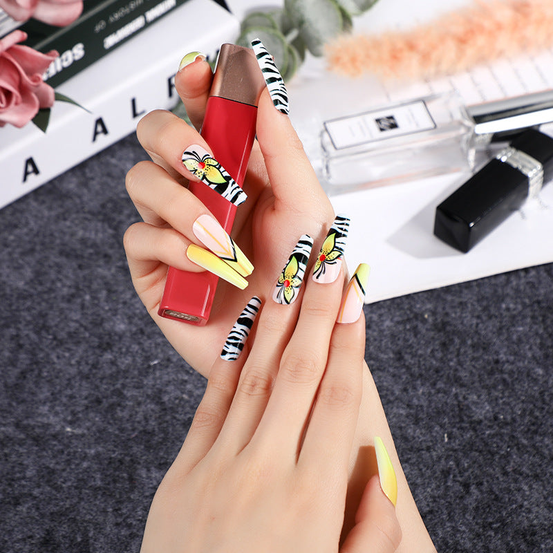 Creative press-on nails with flower and animal designs Stornfield