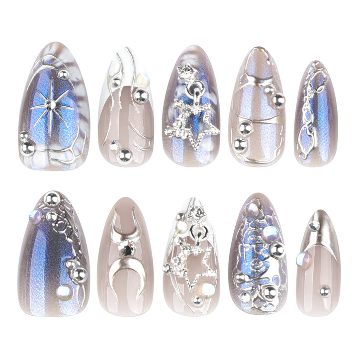Artful Nail Extensions with Shiny Metal Accents Stornfield