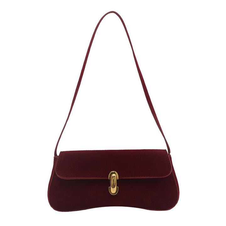 Elegant Suede Handbag with Playful Keychain