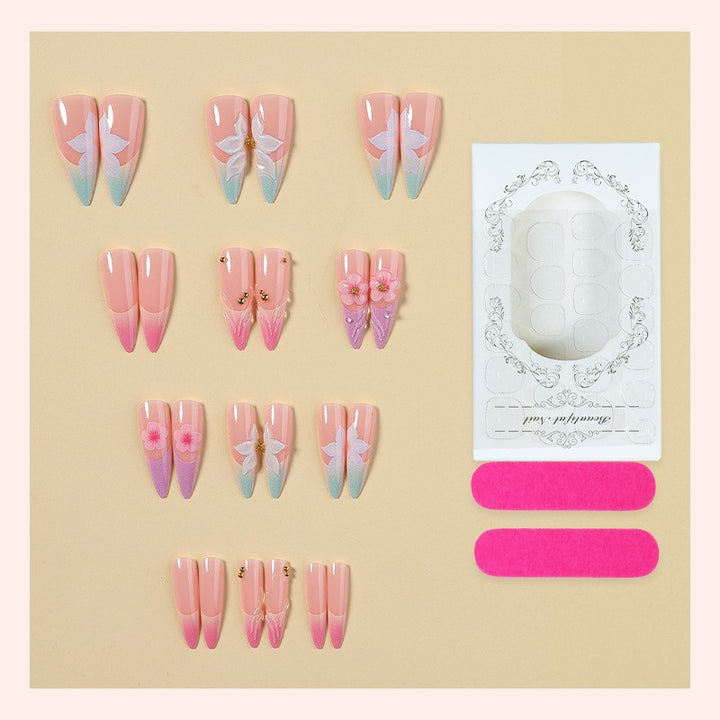 Artificial nail set with elegant flowers and delicate color gradients Stornfield