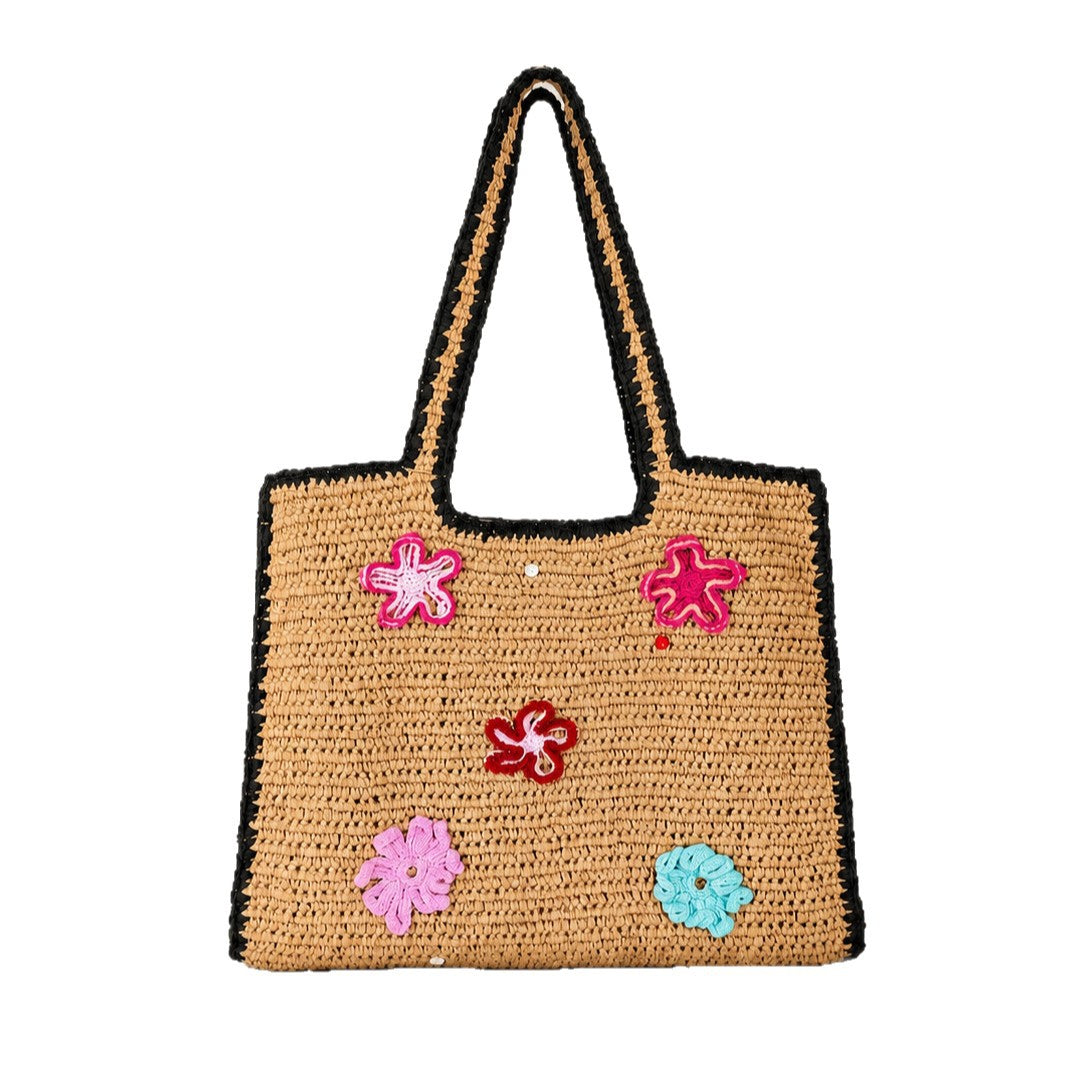 Handmade straw bag with flower appliqués Stornfield