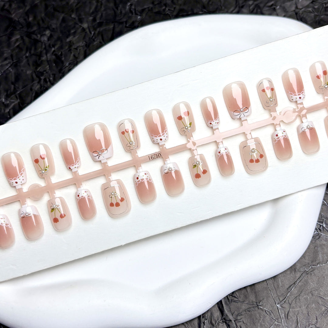Decorative Press-On Nail Art Set with Floral and Whimsical Designs