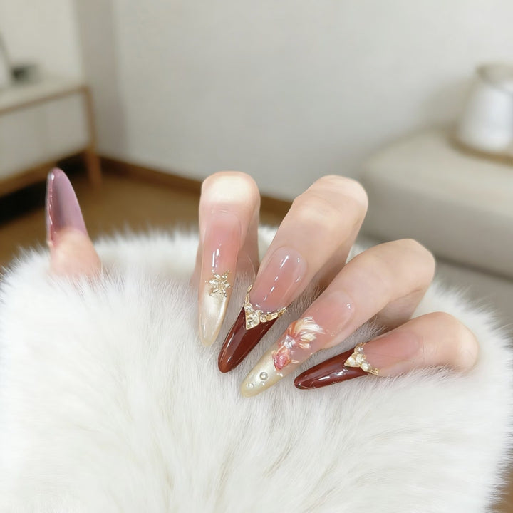 Elegant Stiletto Nail Art Extensions with Decorative Accents