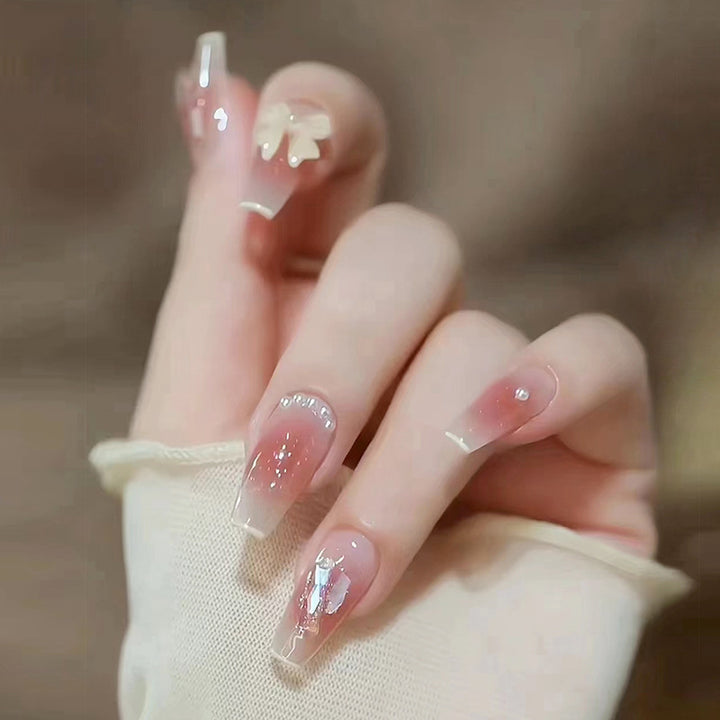 Glamorous artificial nails with sparkling accents Stornfield
