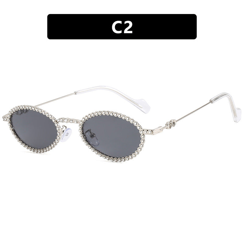 Ladies' fashionable sunglasses with a unique, playful rim Stornfield