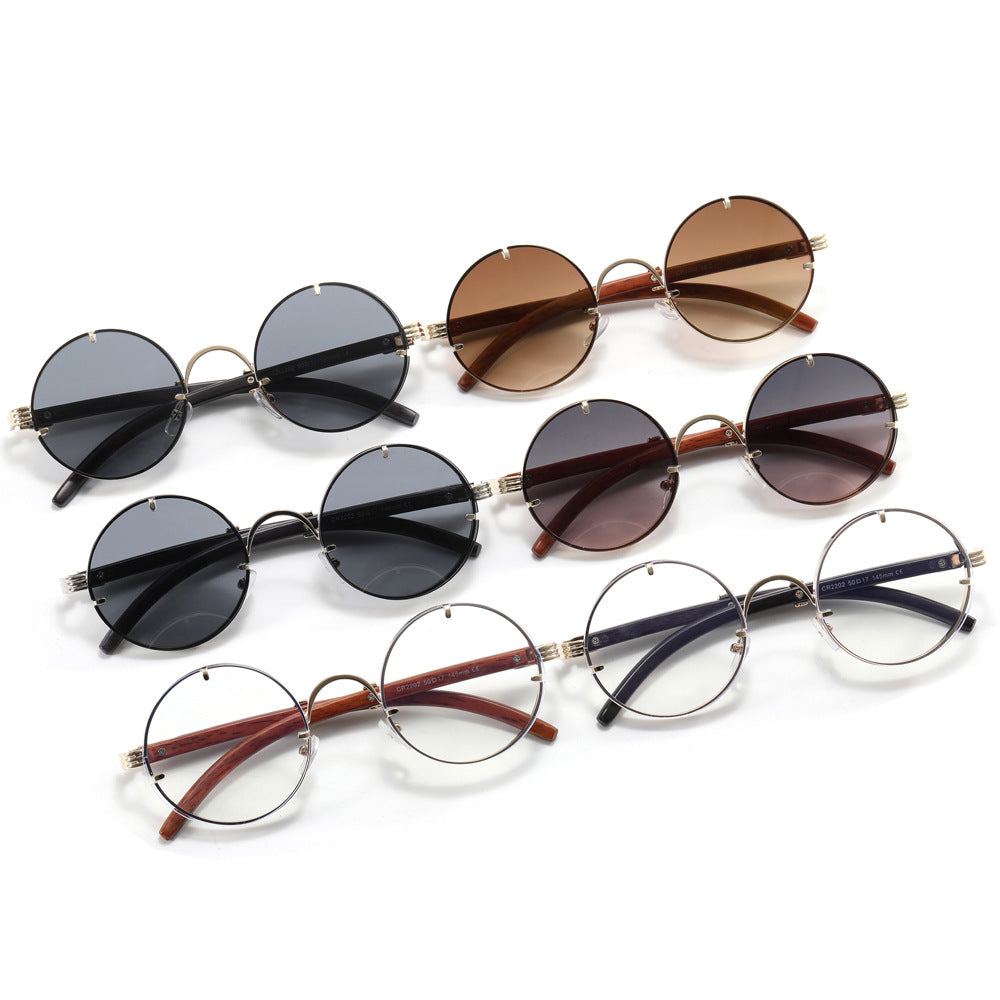 Ladies round sunglasses with luxurious wooden frame and golden accents Stornfield