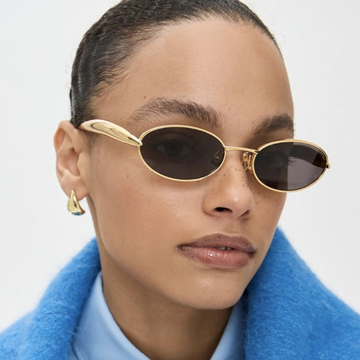 Women's fashionable sunglasses with oval frame and sparkling details Stornfield