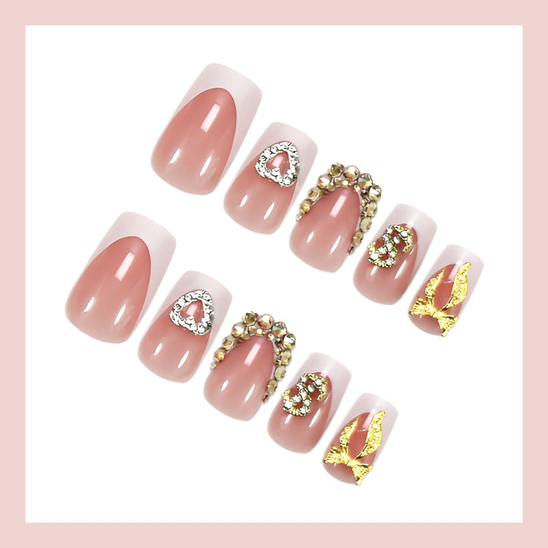 Artificial nail set with elegant jewelry and glitter elements Stornfield