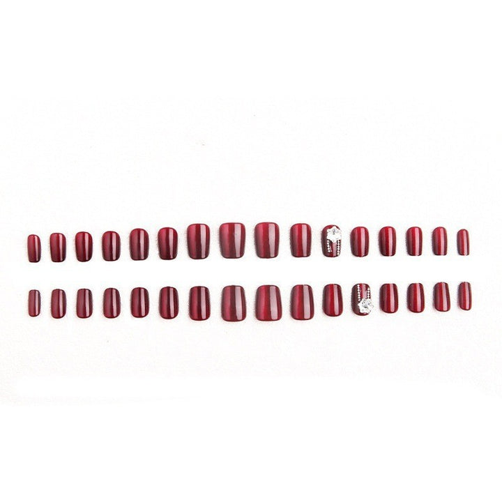 Artificial nail set with sparkling accents and glamorous design Stornfield