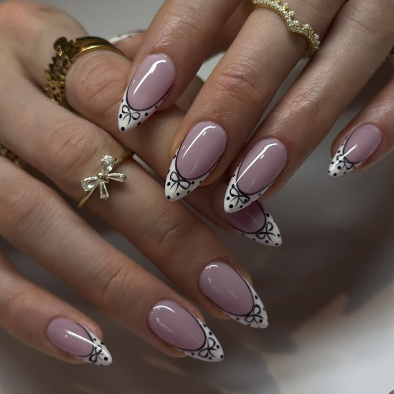 Artistic Stiletto Nails with Elegant Floral Design Stornfield