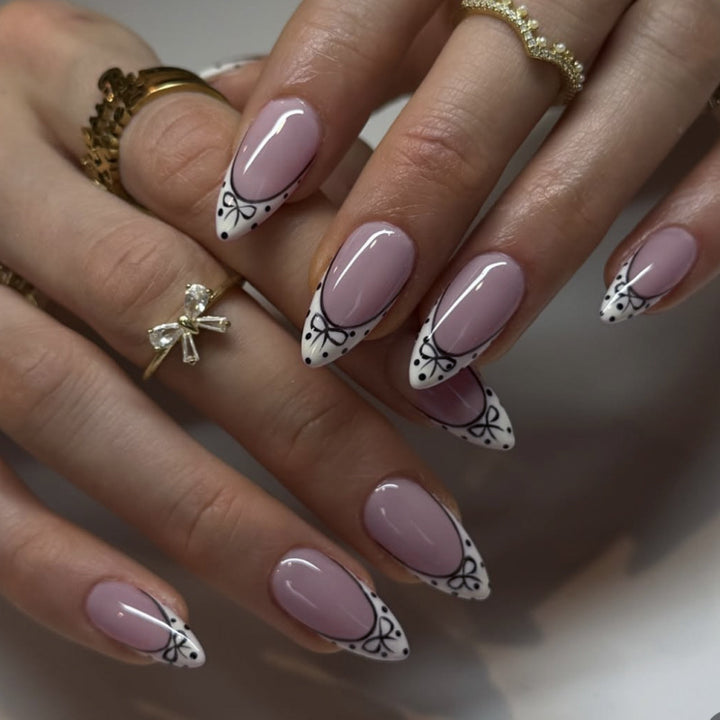 Artistic Stiletto Nails with Elegant Floral Design Stornfield