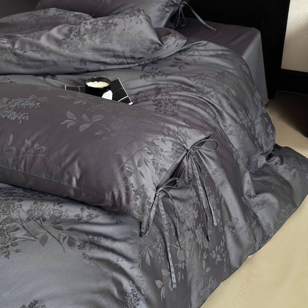 Luxurious jacquard bedding set with bow closures and floral relief