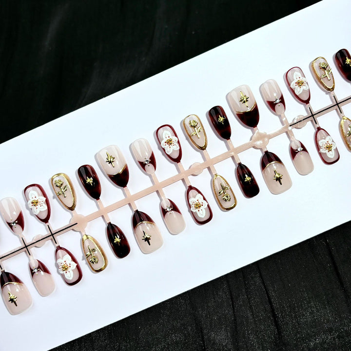 Decorative Press-On Nail Art Set with Floral and Gold Accents