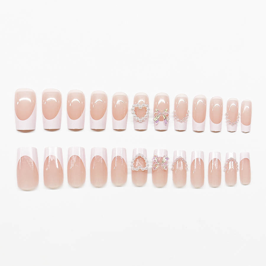 Acrylic nail set with elegant pearl and 3D flower decorations Stornfield