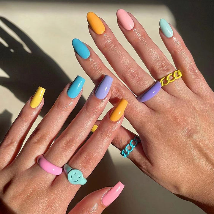 Artificial nail art with colorful designs Stornfield