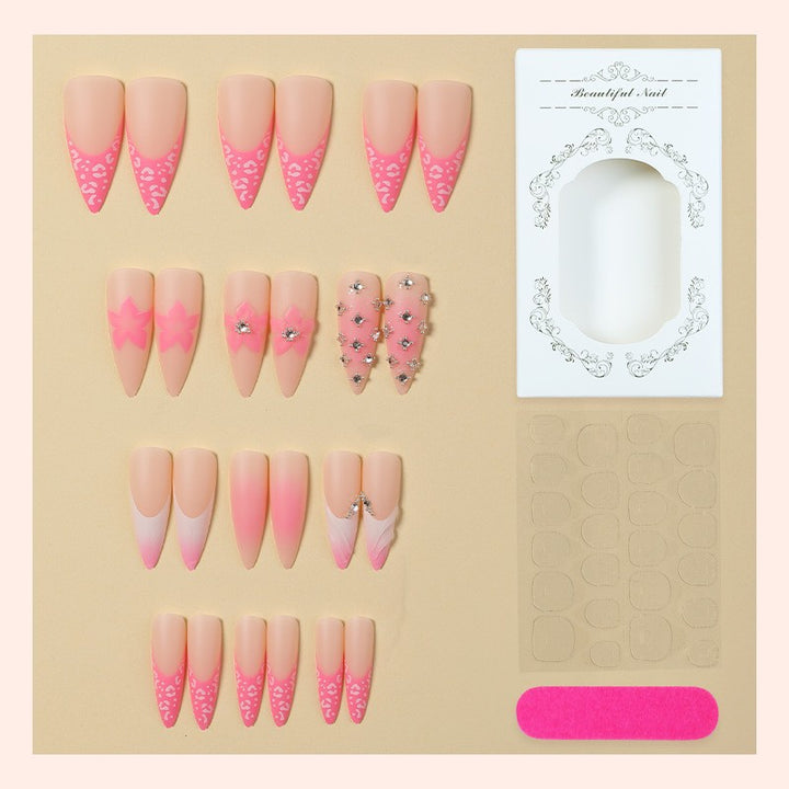 Nail art set with elegant floral embellishments and glamorous accents Stornfield