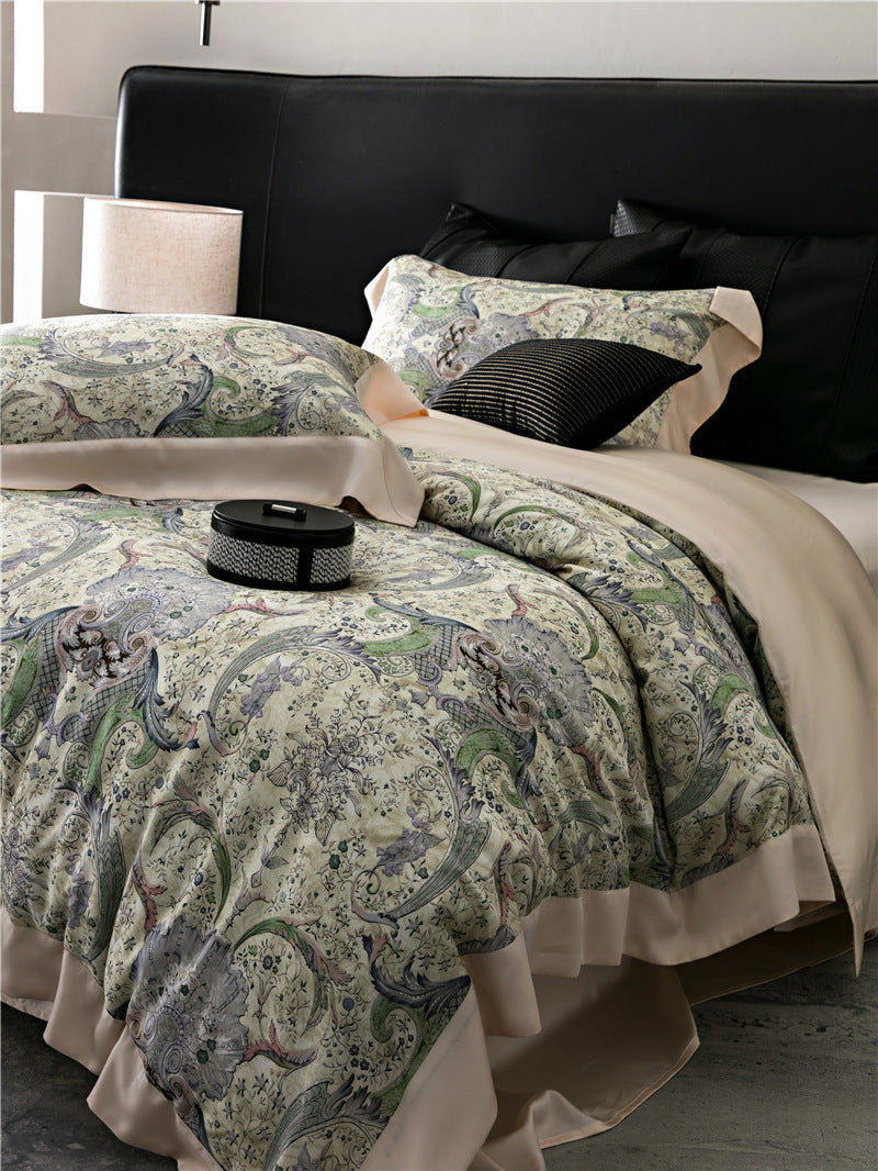 Duvet cover set made of cotton satin with subtle watercolor flower print and silky-matte texture
