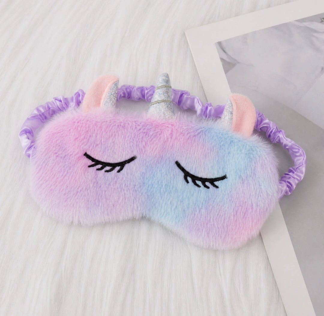 Women's plush-filled unicorn sleep mask with 3D horn, embroidered eyelashes and adjustable satin band Stornfield