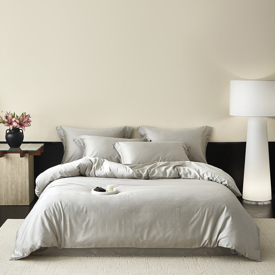 Satin bedding set with silky feel, hotel closure and tone-on-tone pattern