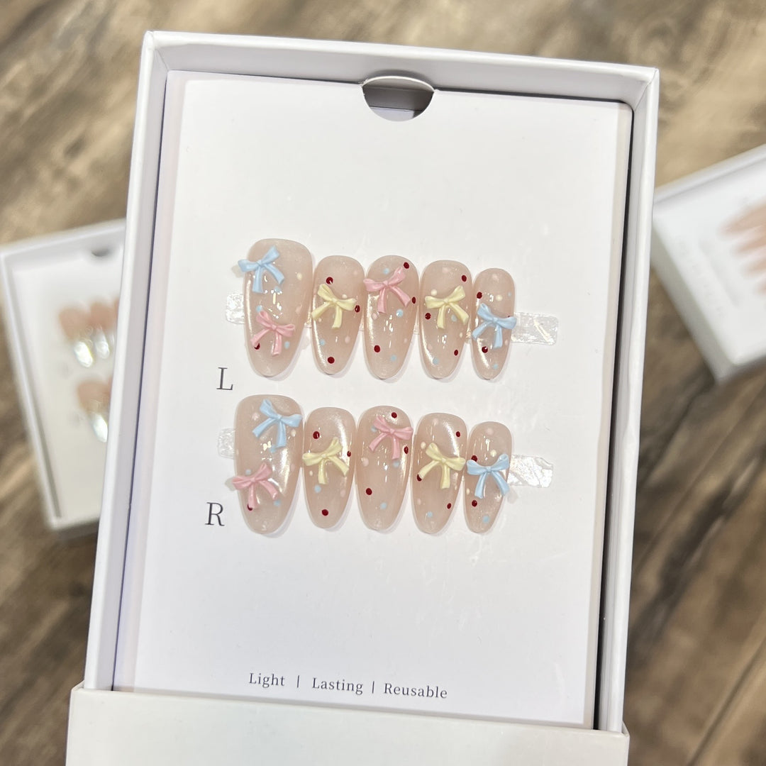 Decorative Press-On Nail Set with Charming Bow and Dots Stornfield