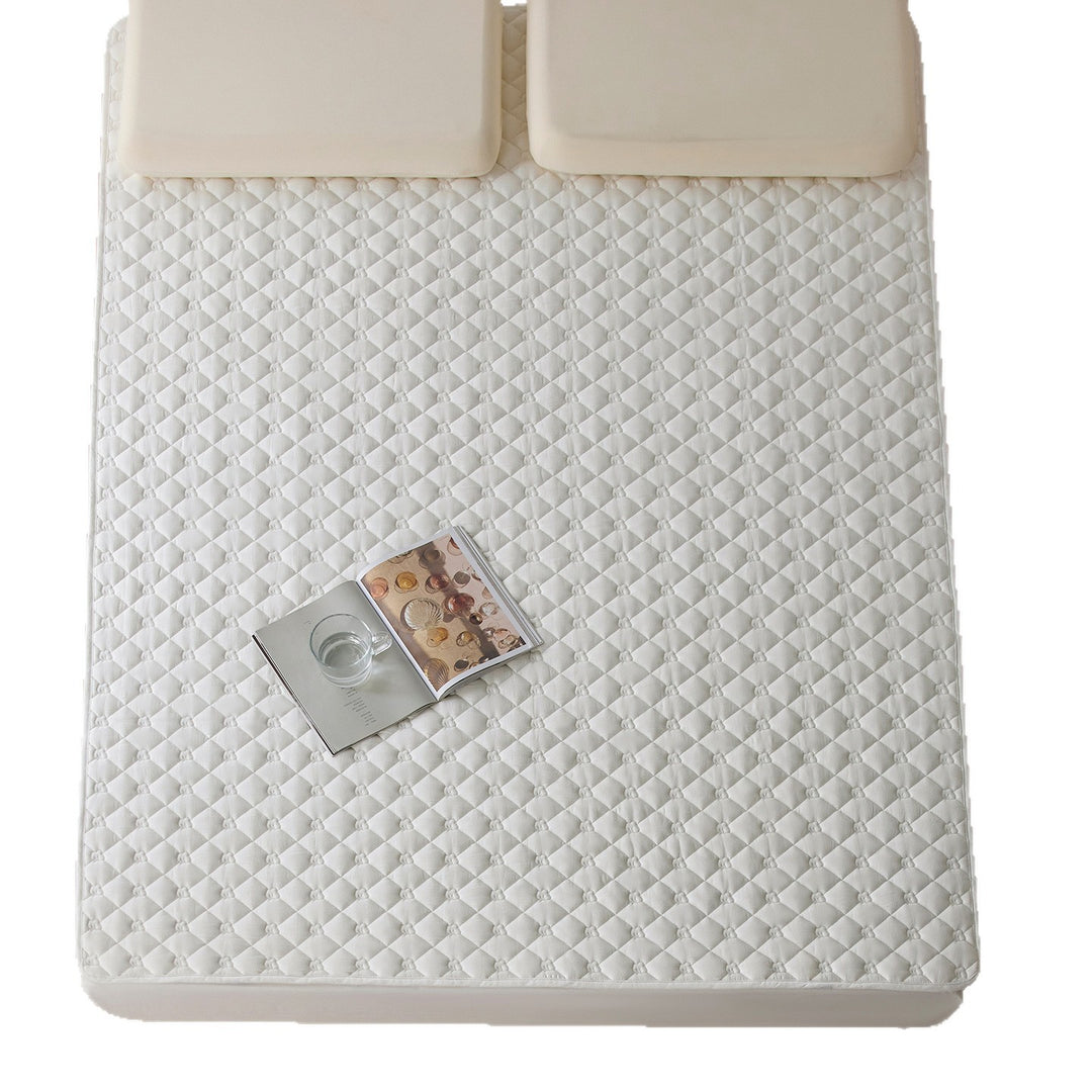 Quilted thermoregulating mattress topper with 3D quilting and non-slip underside