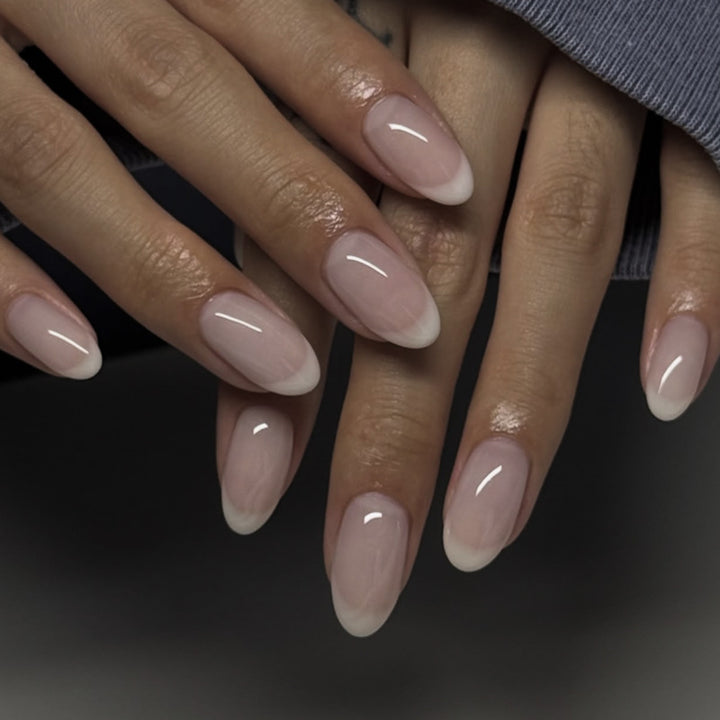 Elegant stiletto nails with classic French tip Stornfield