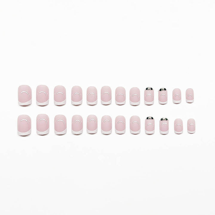 Art nail set with elegant French design and glittering accents Stornfield