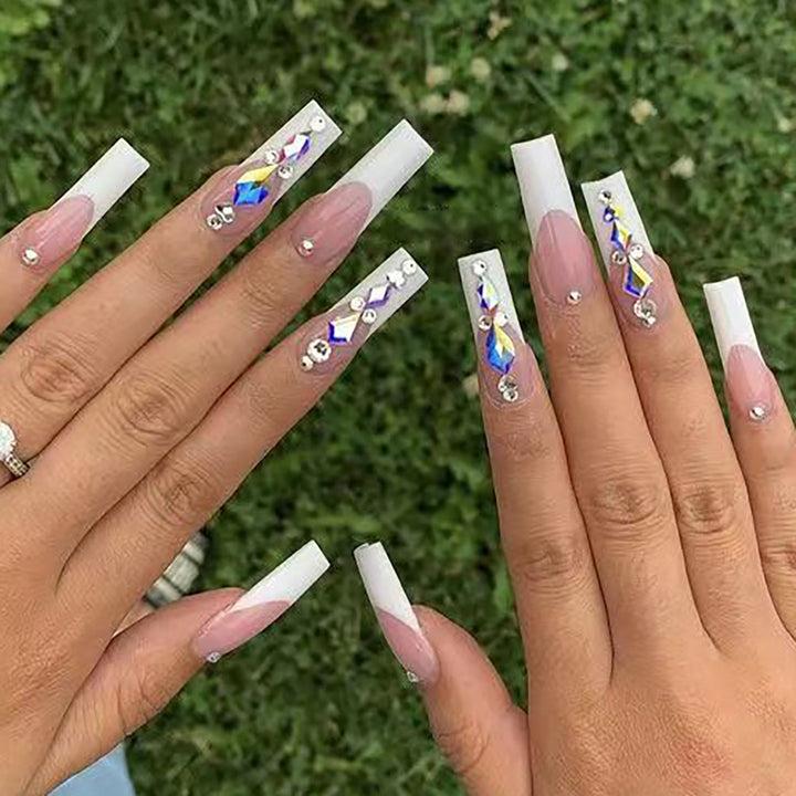 Artificial nail set with glamorous rhinestones and 3D decorations Stornfield