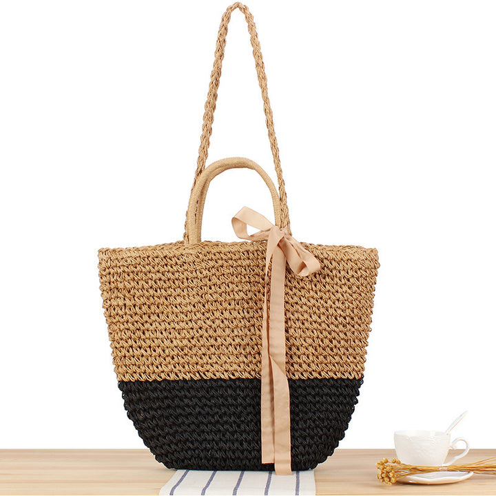 Beach bag made of natural raffia with playful design and elegant bow decoration Stornfield