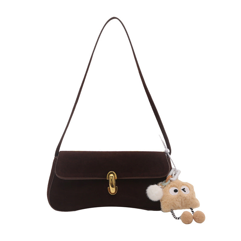 Elegant Suede Handbag with Playful Keychain