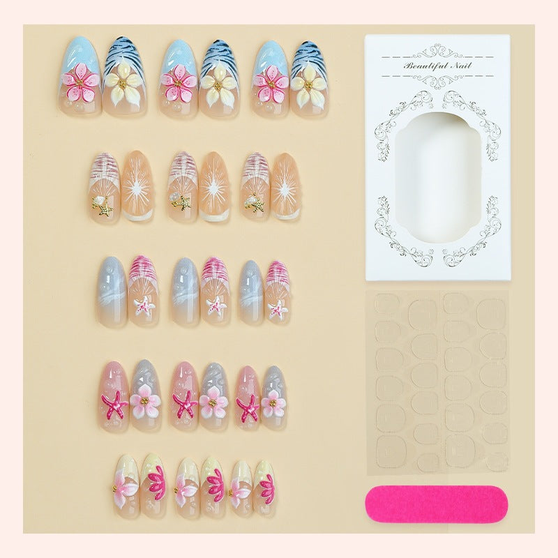 Artificial nail set with floral designs and elegant accents Stornfield