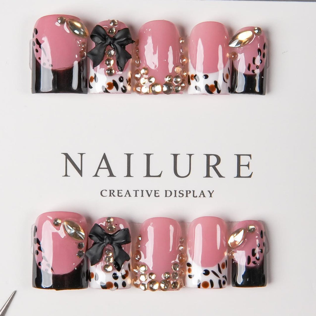 Decorative Press-On Nail Art with Gem Accents