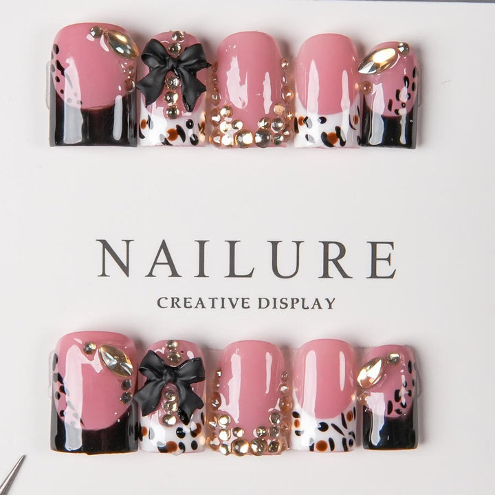 Decorative Press-On Nail Art with Gem Accents