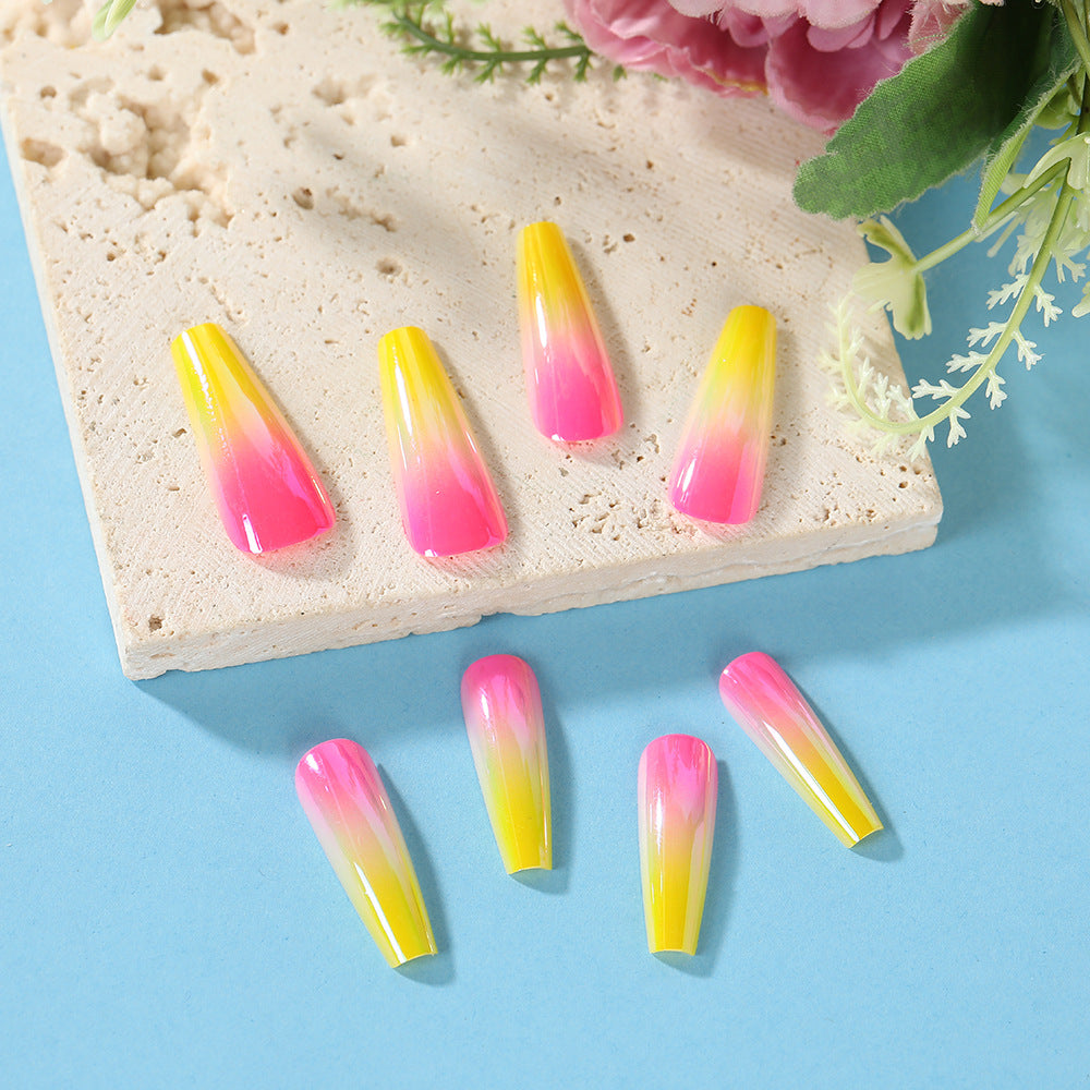 Artificial nail tips in modern ombre design Stornfield