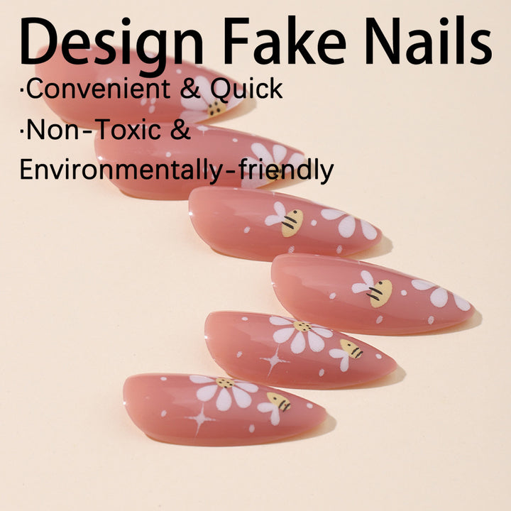 Artificial nails set with elegant flowers and glitter accents Stornfield