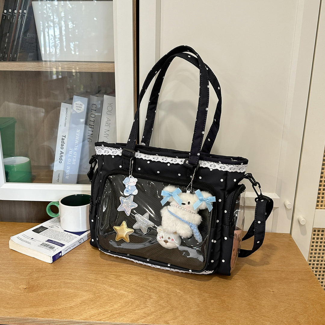 Handbag with Transparent Compartment Division and Playful Application Design Stornfield