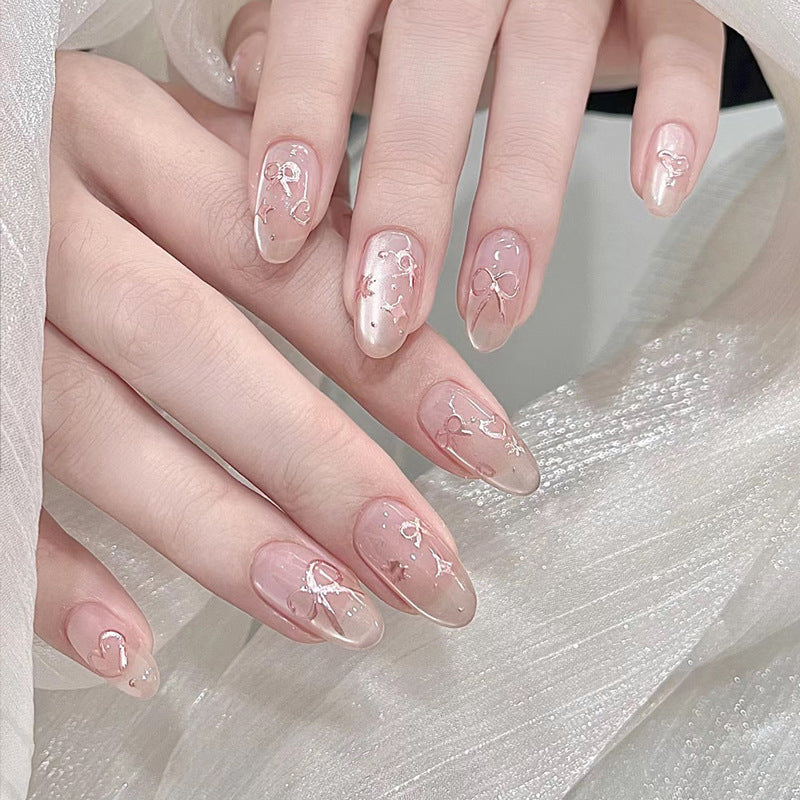 Elegant Artistic Press-On Nail Art with Bow & Heart Designs Stornfield