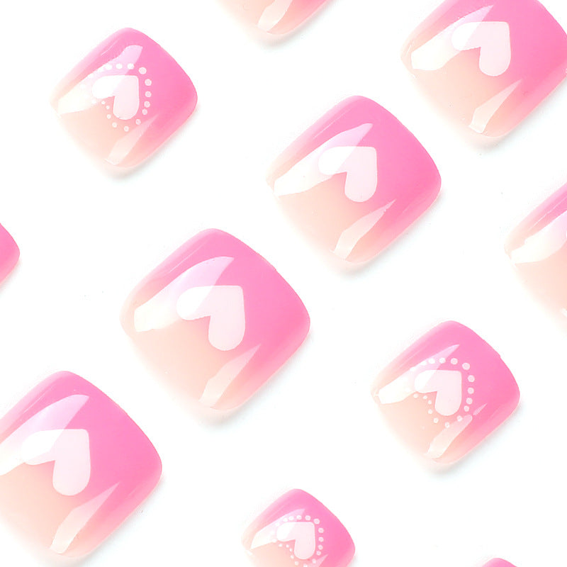 Artful toenail design with heart motifs Stornfield
