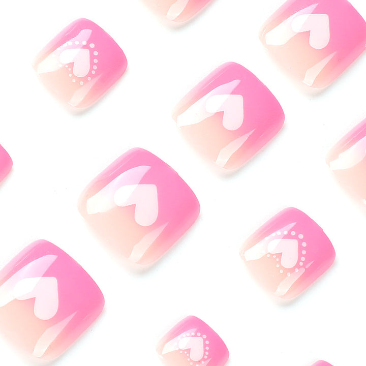 Artful toenail design with heart motifs Stornfield