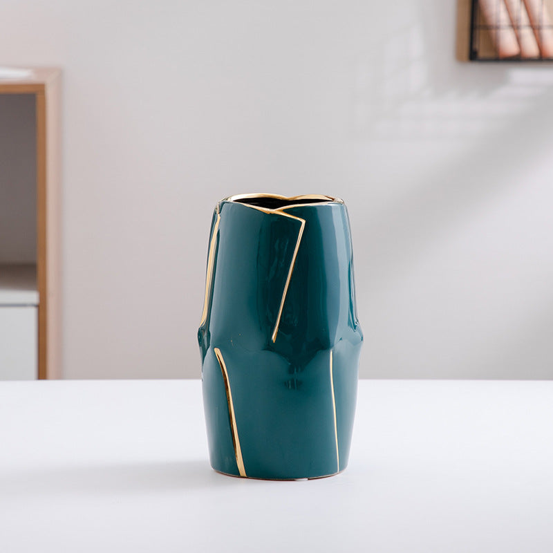 Decorative ceramic vase with golden accents Stornfield