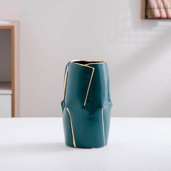 Decorative ceramic vase with golden accents Stornfield