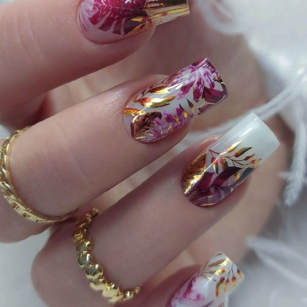 Stylish artificial nails with botanical designs Stornfield