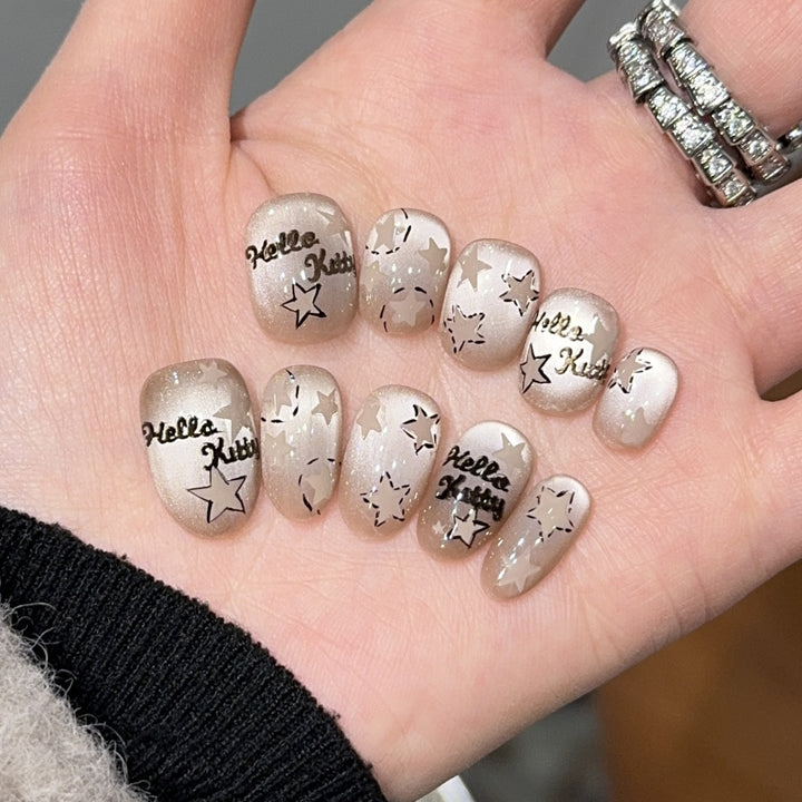 Artificial nail tips with Hello Kitty design Stornfield