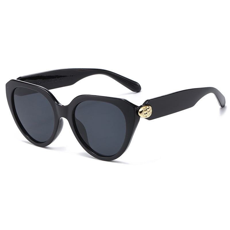 Ladies Cat-Eye Sunglasses with Golden Accents and Protective UV Filter Stornfield