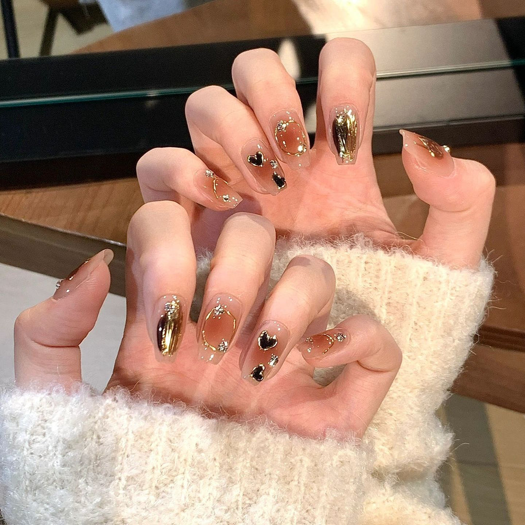Artistic Press-On Nail Set with Heart and Glitter Accents Stornfield