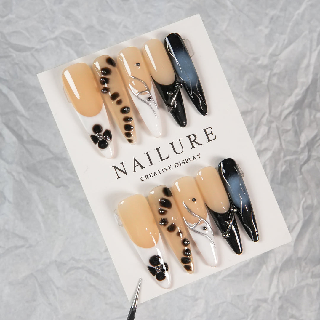 Artistic Stiletto Press-On Nails with Unique Patterning